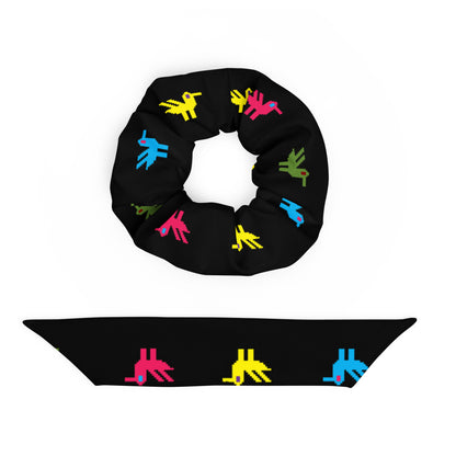 Ducks Recycled Scrunchie | Black Multicolor, a black scrunchie made of recycled materials with bright yellow, pink, blue, and green ducks printed on it.