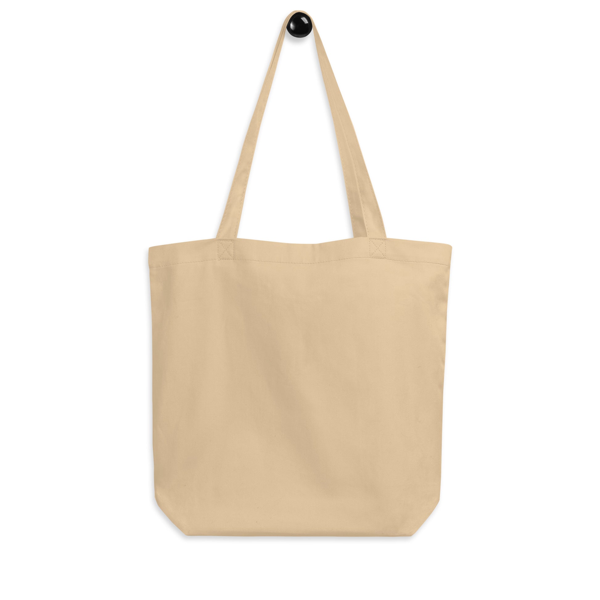 The back of a natural colored 100% organic cotton reusable shopping tote bag.