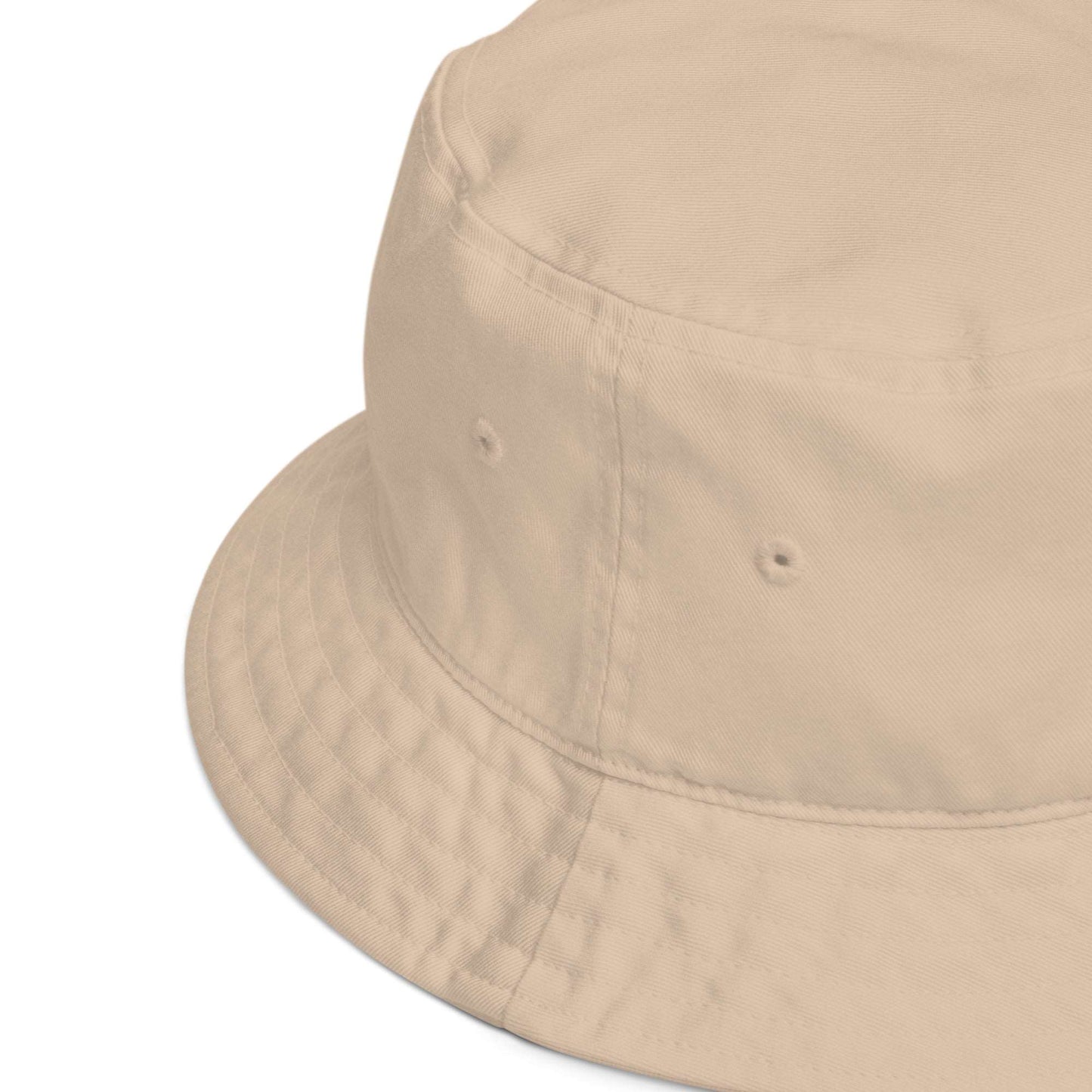 Roosters Organic bucket hat, detail of the rim of a tan bucket hat.