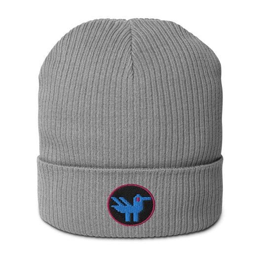 A grey beanie made of 100% organic cotton with a patch embroidered on the front. The patch is a black circle with a pink border with a blue retro style duck inside.