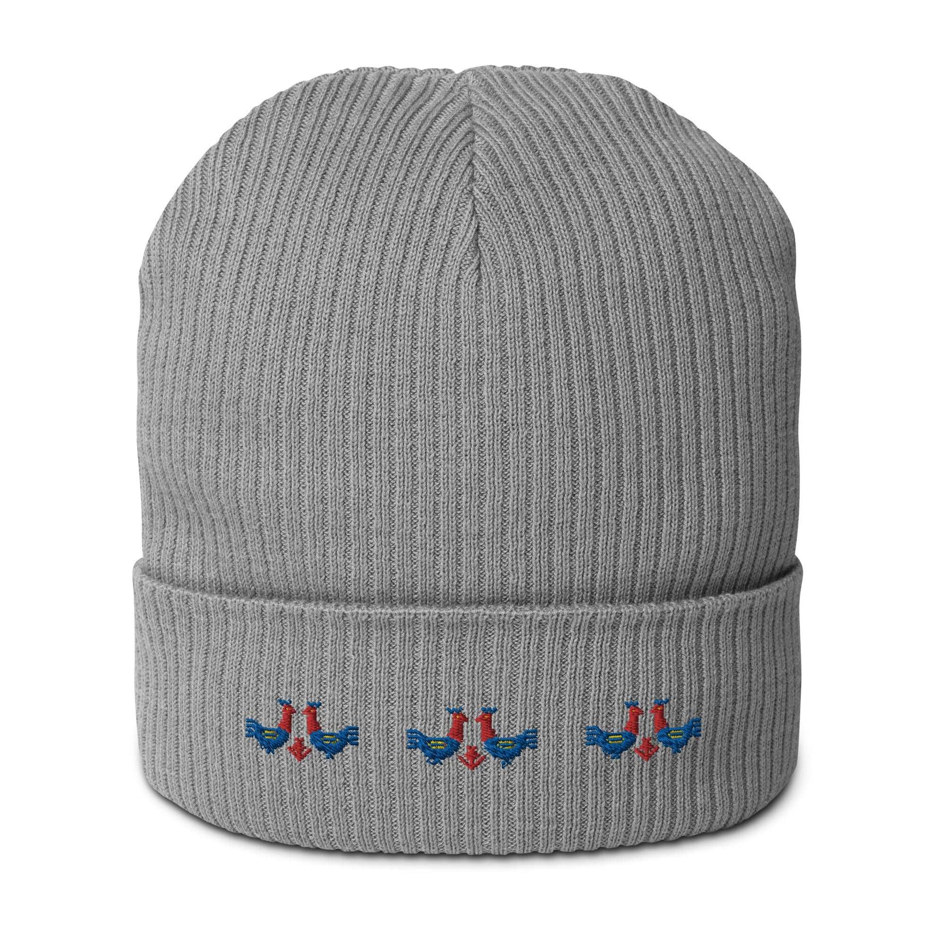 A 100% organic cotton light grey ribbed beanie with 3 pairs of red and blue roosters embroidered on the front.