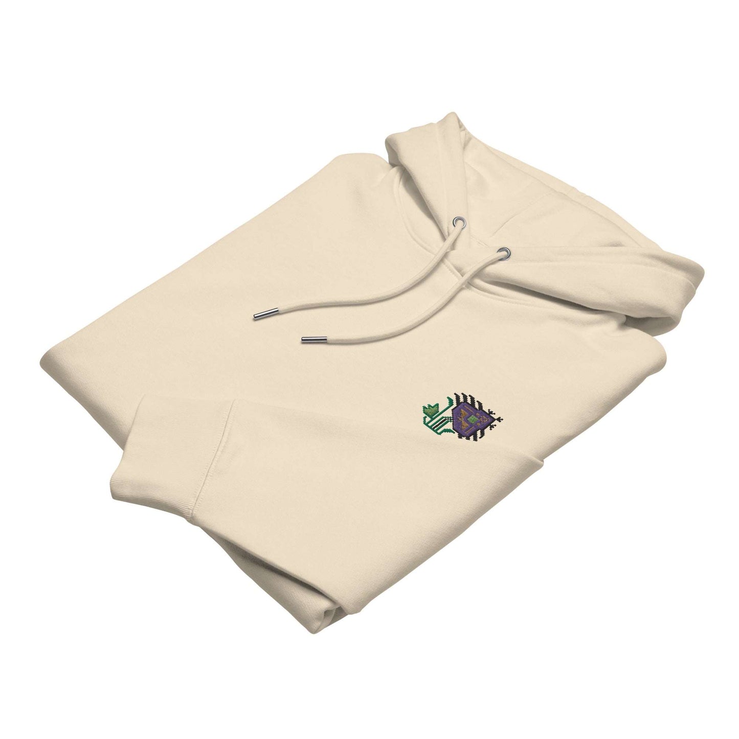 A light tan hoodie made of organic cotton and recycled polyester with an intricate purple flower embroidered on the top left. It is folded and shows the embroidery detail.