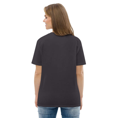 The back of a woman wearing a black t-shirt made of 100% organic cotton.