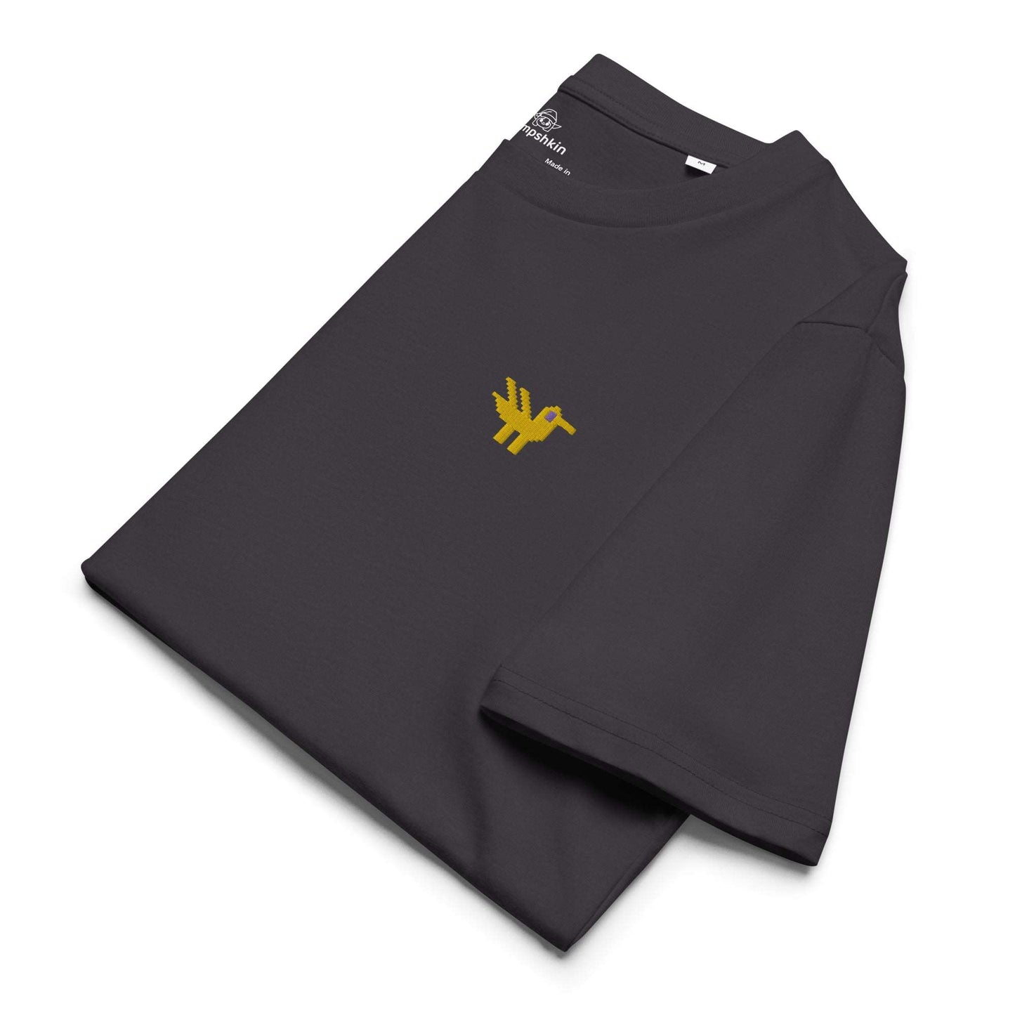 A dark grey t-shirt made of 100% organic cotton with a yellow duck embroidered on the top left. The shirt is folded showing the embroidery detail and the left sleeve.