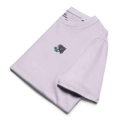 A purple t-shirt made of 100% organic cotton with an intricate purple flower embroidered on the top left. The shirt is folding showing the embroidery detail and the left sleeve.