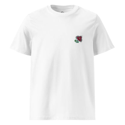 A white t-shirt made of 100% organic cotton with an intricate pink flower embroidered on the top left.