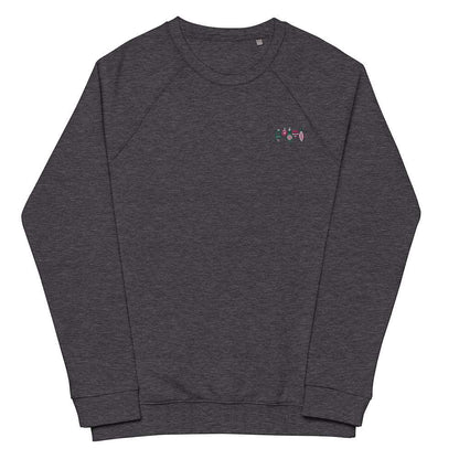 A charcoal grey sweatshirt with four small Christmas ornaments embroidered on the top left. The ornaments have varying shapes and patterns and are colored pink, green, and white.